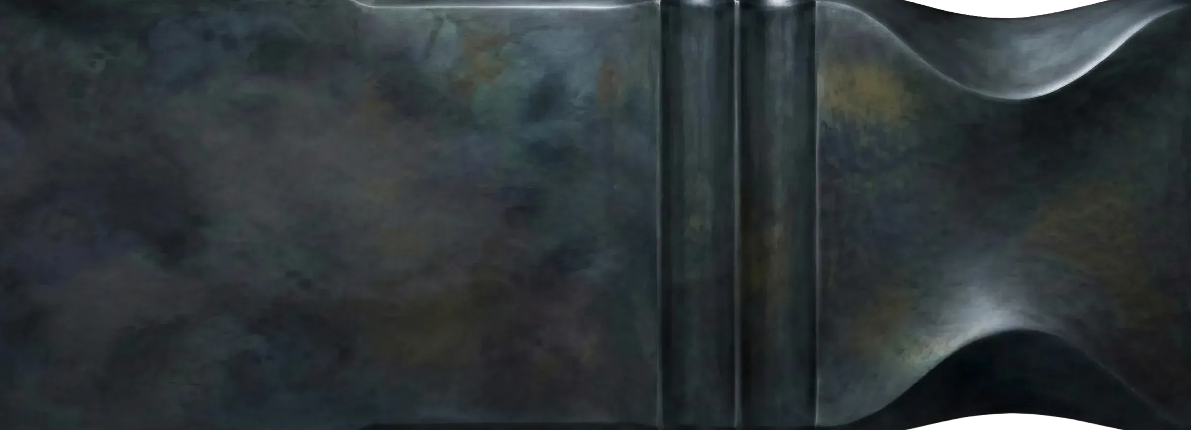 Blackened Zinc liquid metal finish sample by Modulux with dark blue-grey zinc tone, cloudy variation, and sculpted architectural geometry.