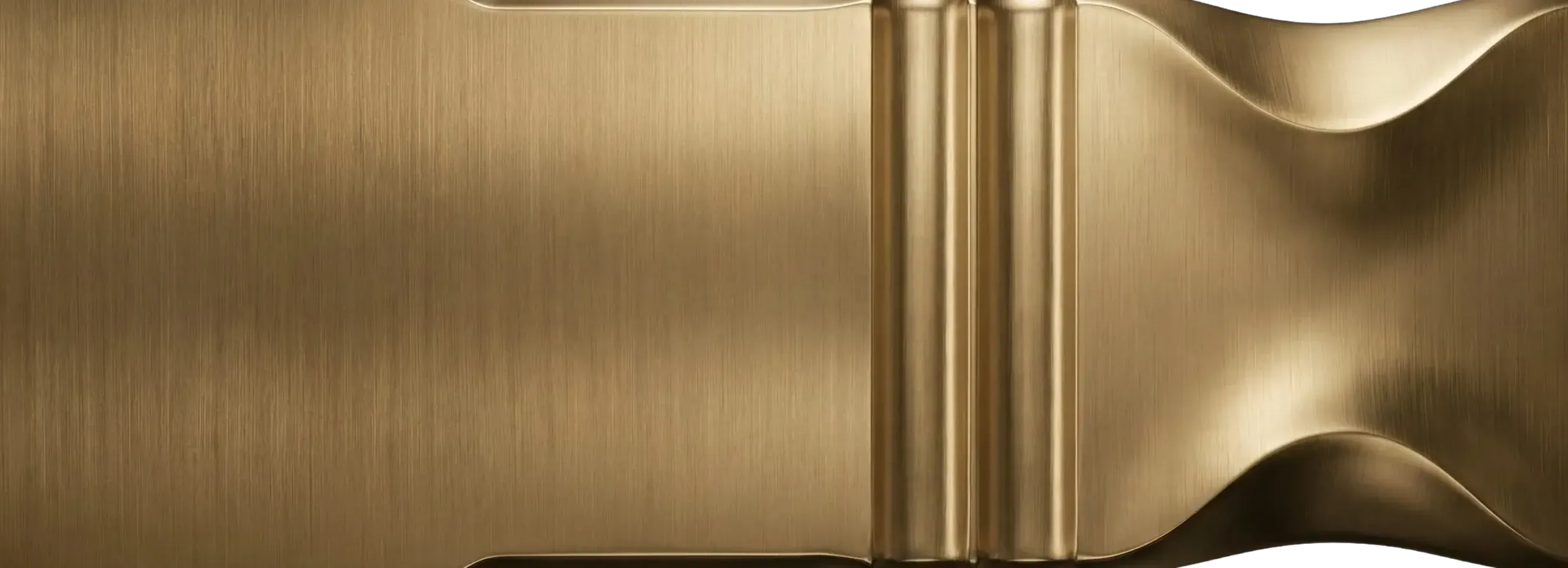 Wide Brushed Brass finish sample with warm brass tone, fine directional brushing, soft satin sheen, and sculptural profile detail