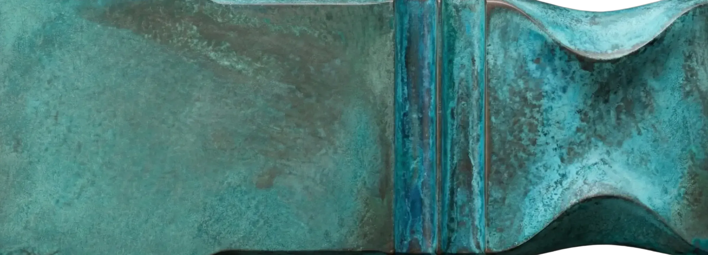 Copper Tiffany Patina finish sample by Modulux with turquoise blue-green patina, darker aged areas, and sculpted architectural geometry.