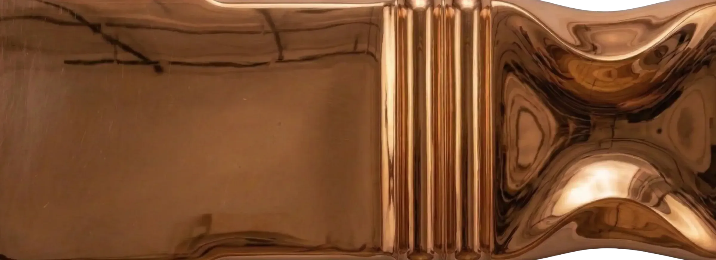 Polished Copper liquid metal finish sample by Modulux with glossy reflective copper tone and sculpted architectural geometry.