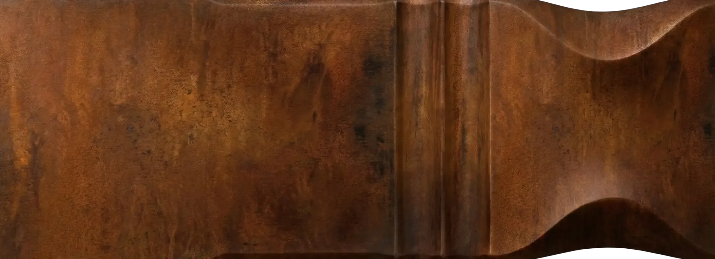 Rust architectural metal finish sample by Modulux with warm orange-brown tone, darker aged markings, and sculpted profile details.